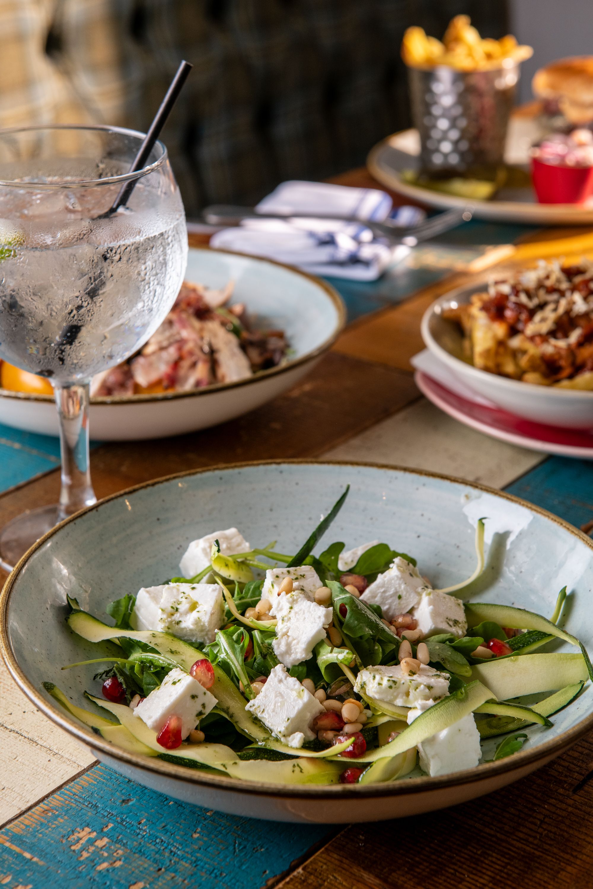 Feta salad with gin and tonic drink